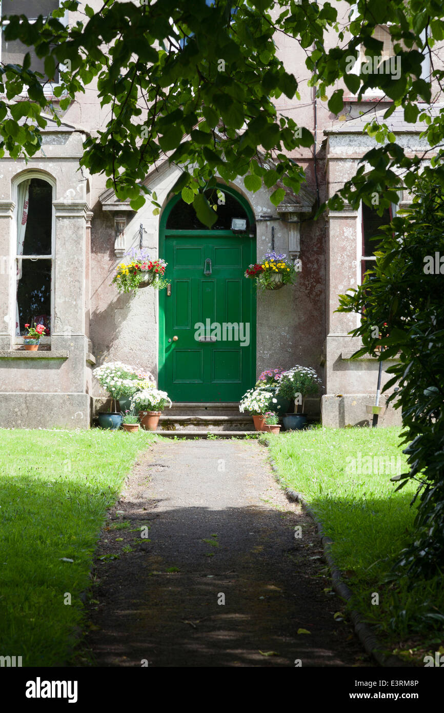 Doorway with flowers, St Davids, Pembrokeshire Stock Photo