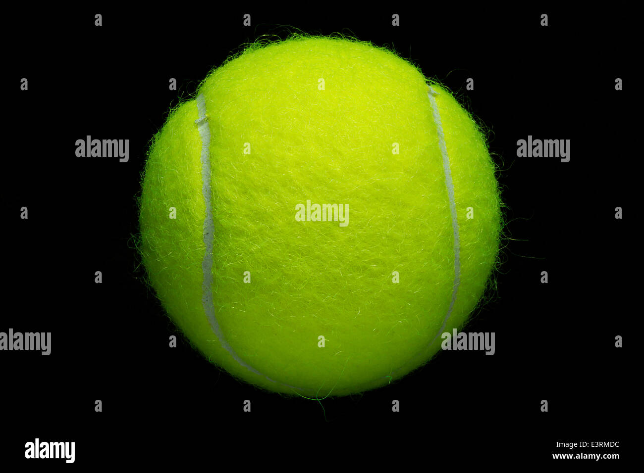tennis ball on black background Stock Photo - Alamy
