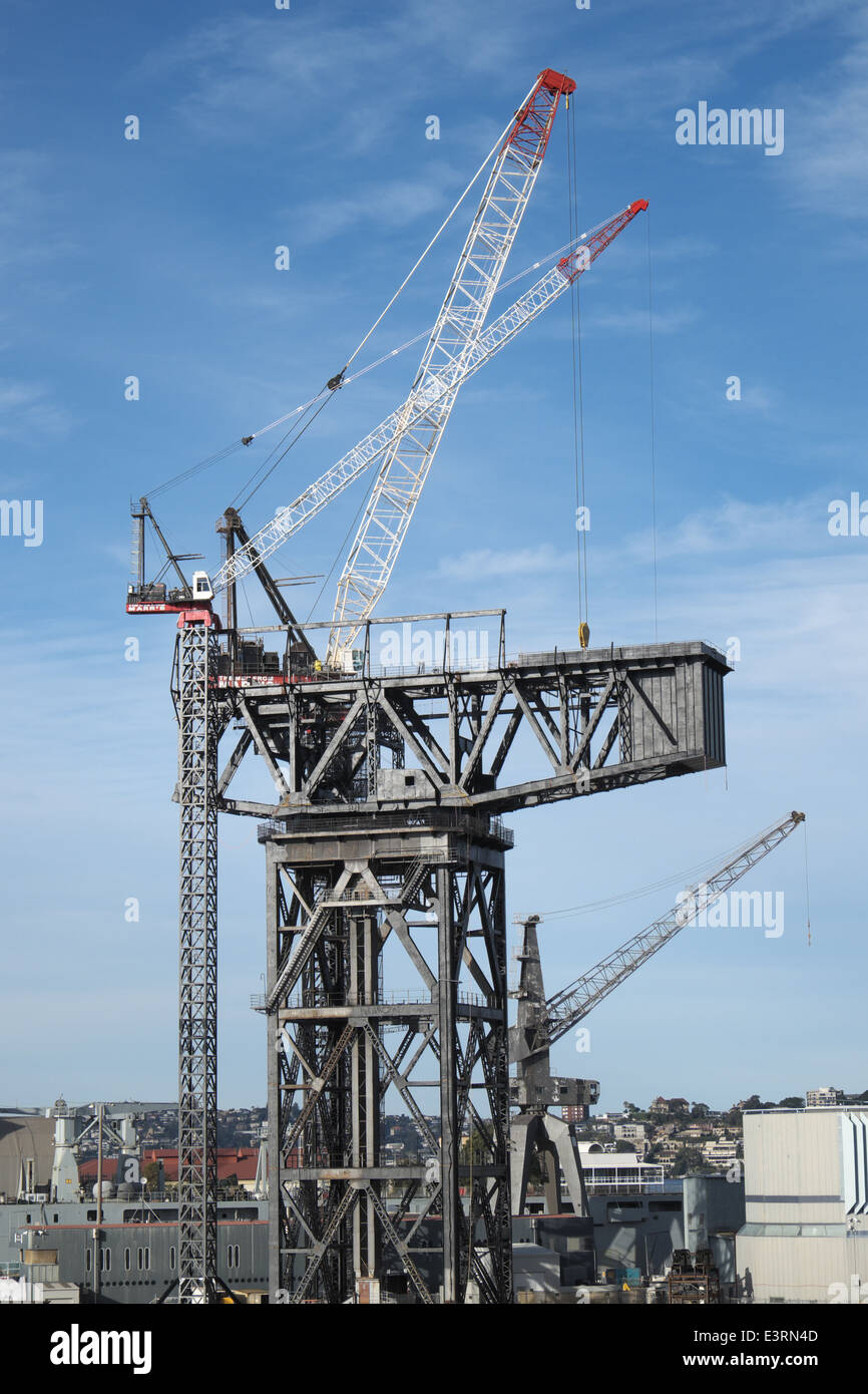 hammerhead crane now being pulled down, at sydney's garden island naval base,new south wales,australia Stock Photo