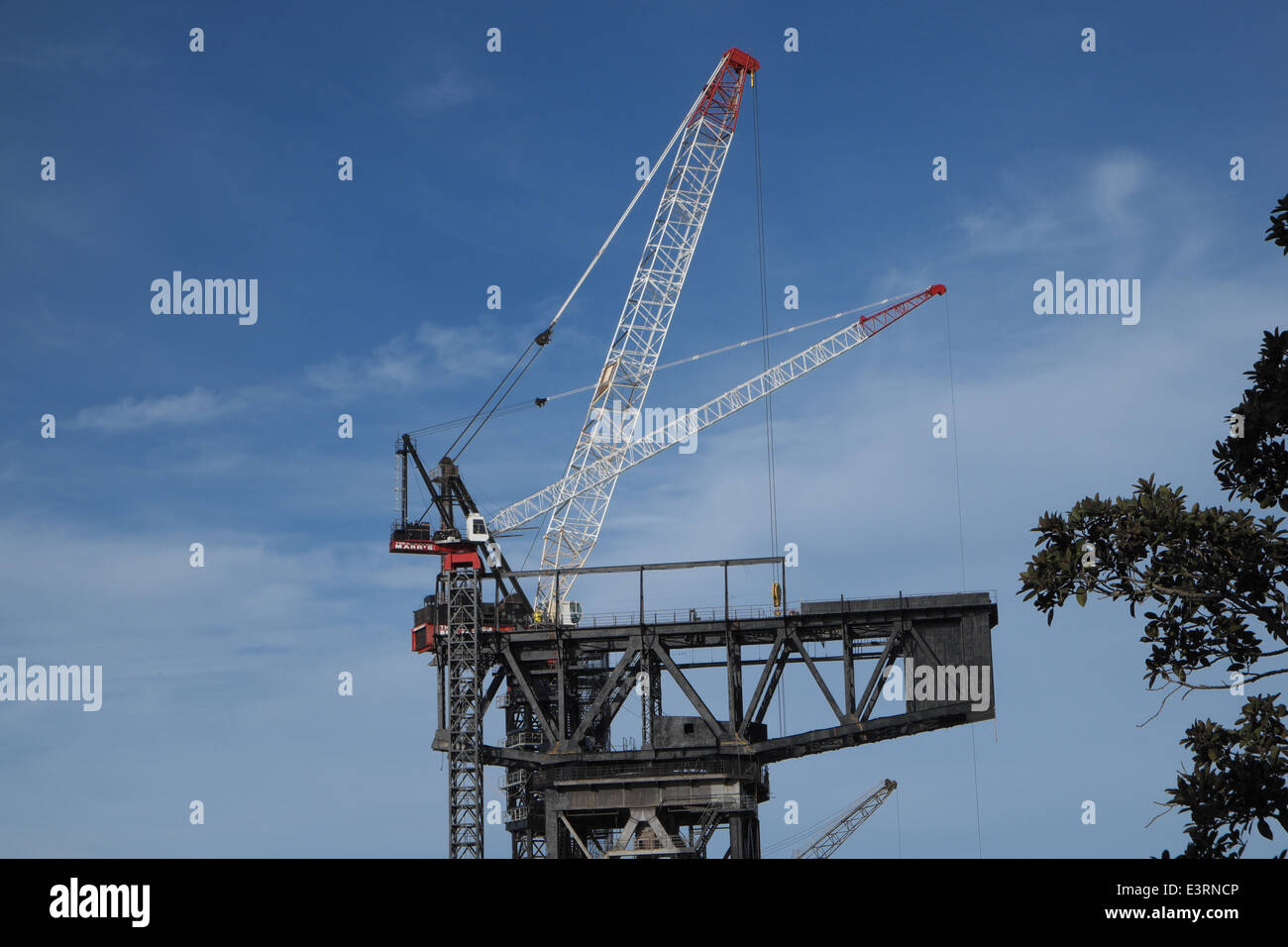 hammerhead crane now being pulled down, at sydney's garden island naval base,new south wales,australia Stock Photo