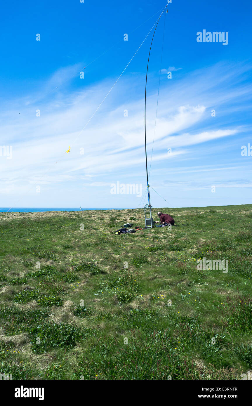 dh  AMATEUR RADIO UK Ham wireless operator outdoors radio and aerial mast antenna Stock Photo