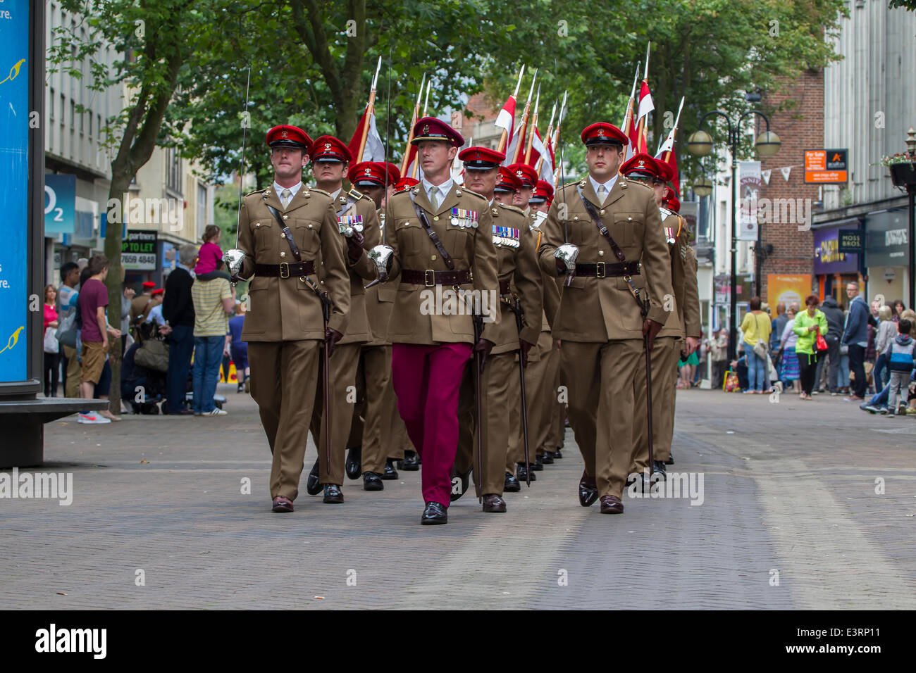Northampton, UK. 28th June, 2014. The 9th/12th Royal Lancers proudly parade through Northampton town centre as the regiment returns to the UK after months serving in Afghanistan and to mark the Armed Forces Day. This is the first time the regiment has had the opportunity to march through the streets of Northampton since being awarded Freedom of the Borough in 2012. Credit:  Keith J Smith./Alamy Live News Stock Photo