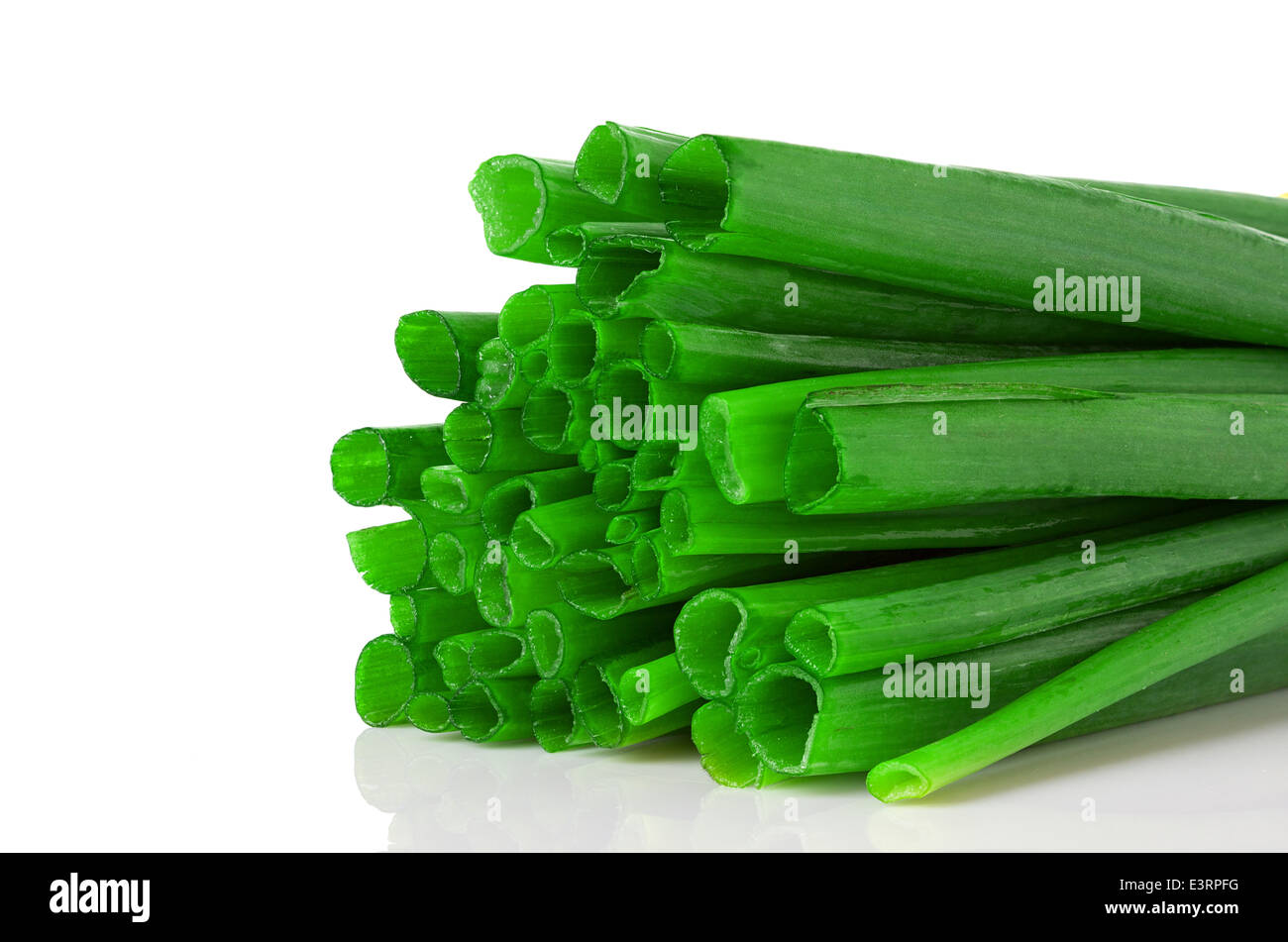 Fresh chives close up on white background Stock Photo