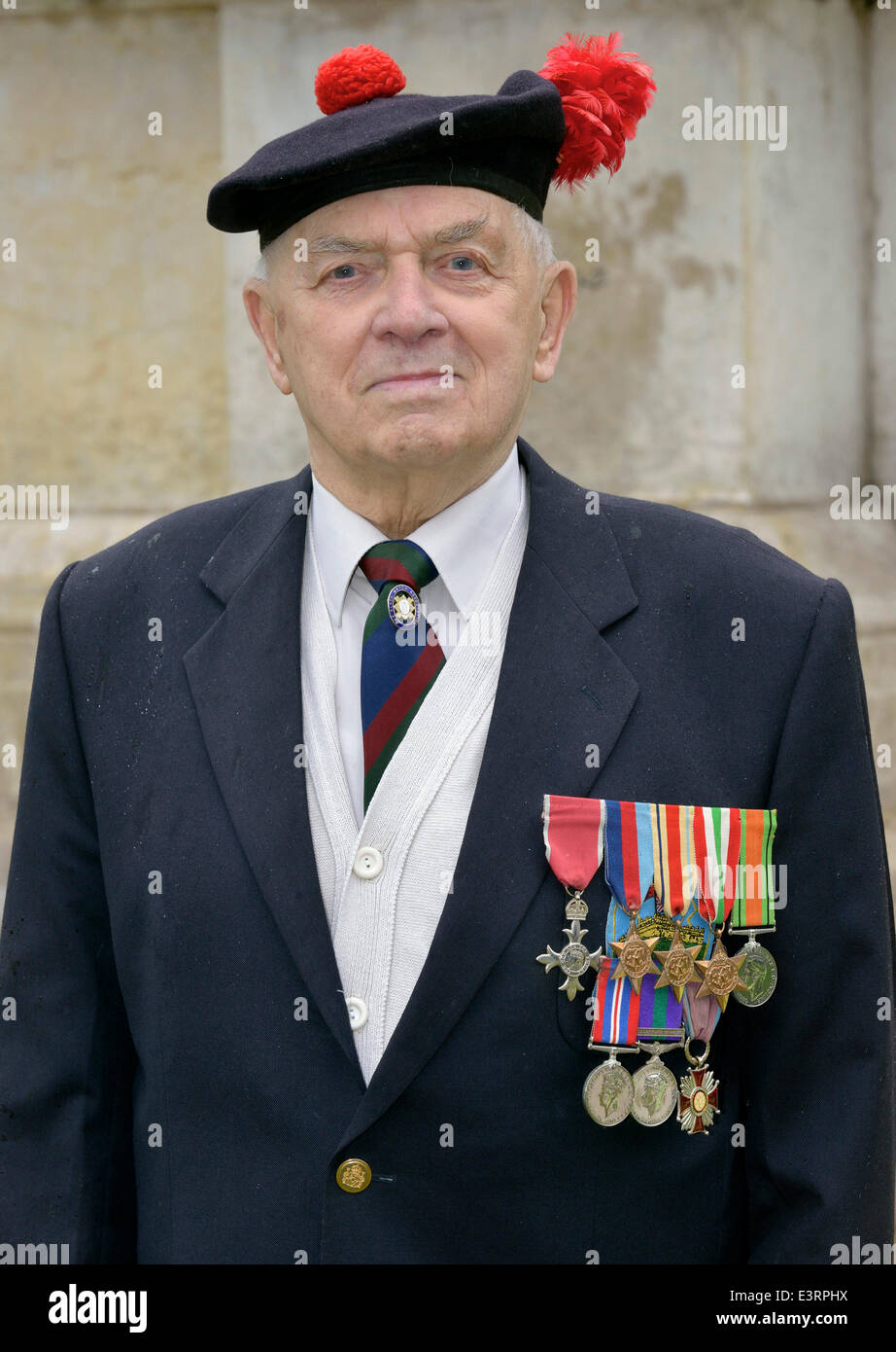 Manchester, UK. 28th June, 2014. 91 year-old John Clarke, a member of the Black Watch Association attends the Manchester Armed Forces Day in Piccadilly Gardens. John, a holder of the MBE and Polish Gold Cross, is possibly the last surviving soldier from the Battle of Monte Cassino in Italy during WW2. Armed Forces Day Manchester, UK Credit:  John Fryer/Alamy Live News Stock Photo