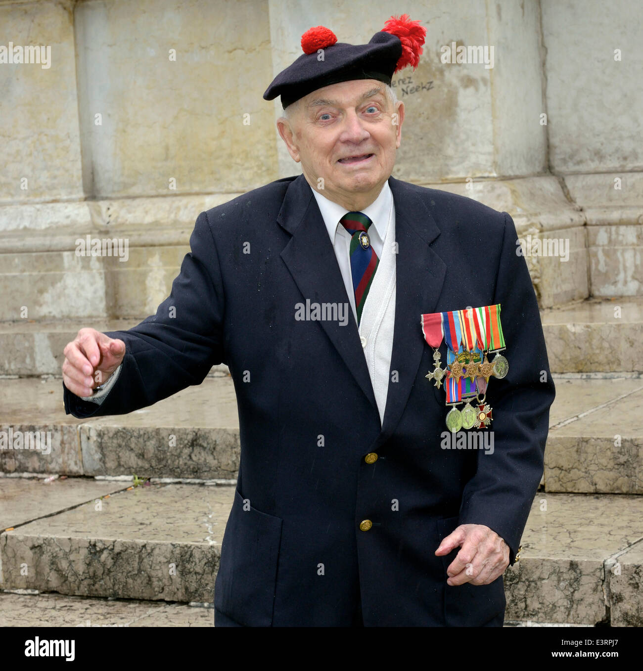 Manchester, UK. 28th June, 2014. 91 year-old John Clarke, a member of the Black Watch Association attends the Manchester Armed Forces Day in Piccadilly Gardens. John, a holder of the MBE and Polish Gold Cross, is possibly the last surviving soldier from the Battle of Monte Cassino in Italy during WW2. Armed Forces Day Manchester, UK Credit:  John Fryer/Alamy Live News Stock Photo