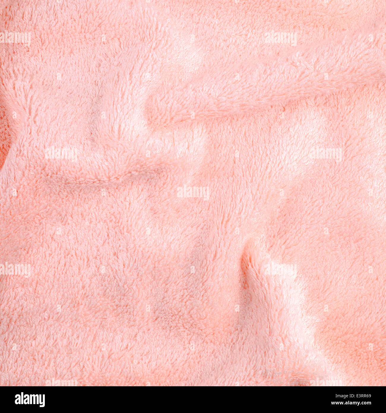 pink texture of bath towel folded as a background Stock Photo