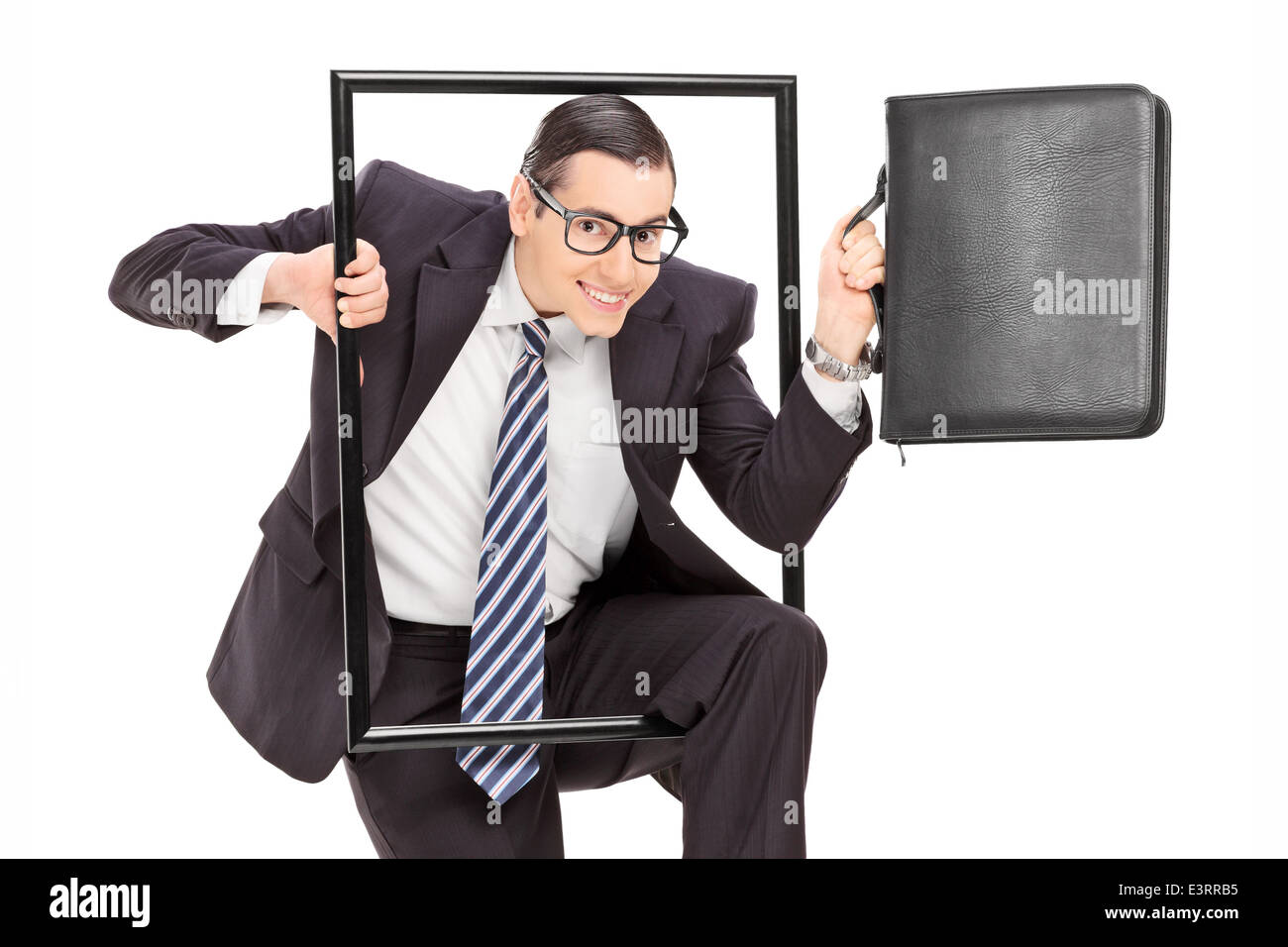 Businessman walking through a frame Stock Photo