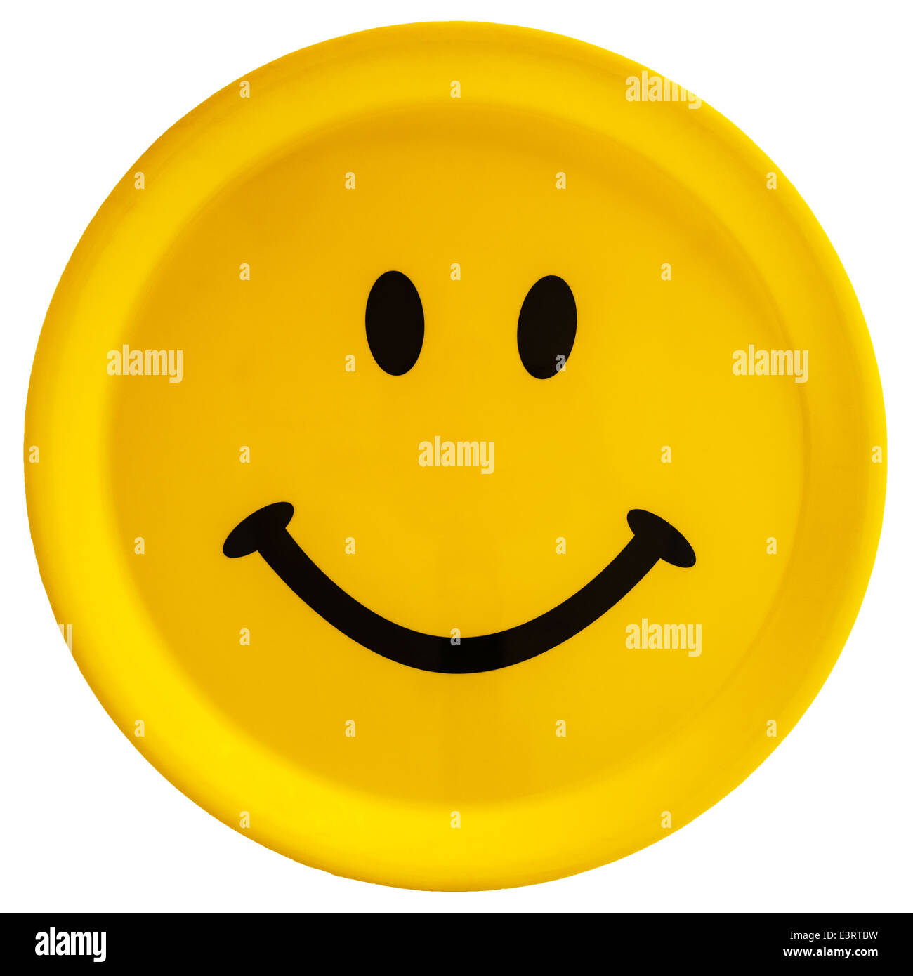 A Smiley face cutout on a white background Stock Photo