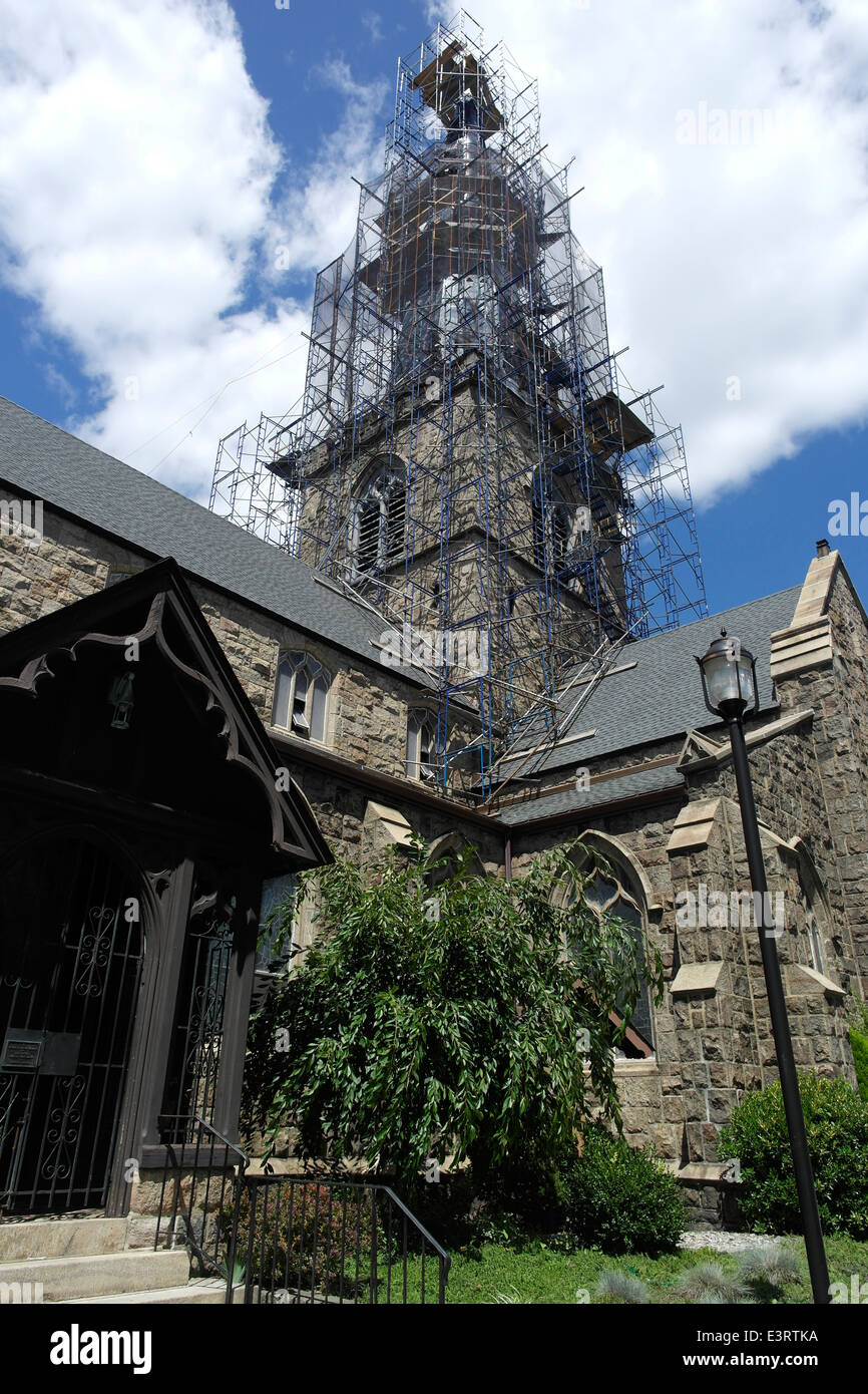 Renovation of Steeple above Victorian Gothic Church, St. John Episcopal on Staten Island, built in 1871 and has landmark status. Stock Photo