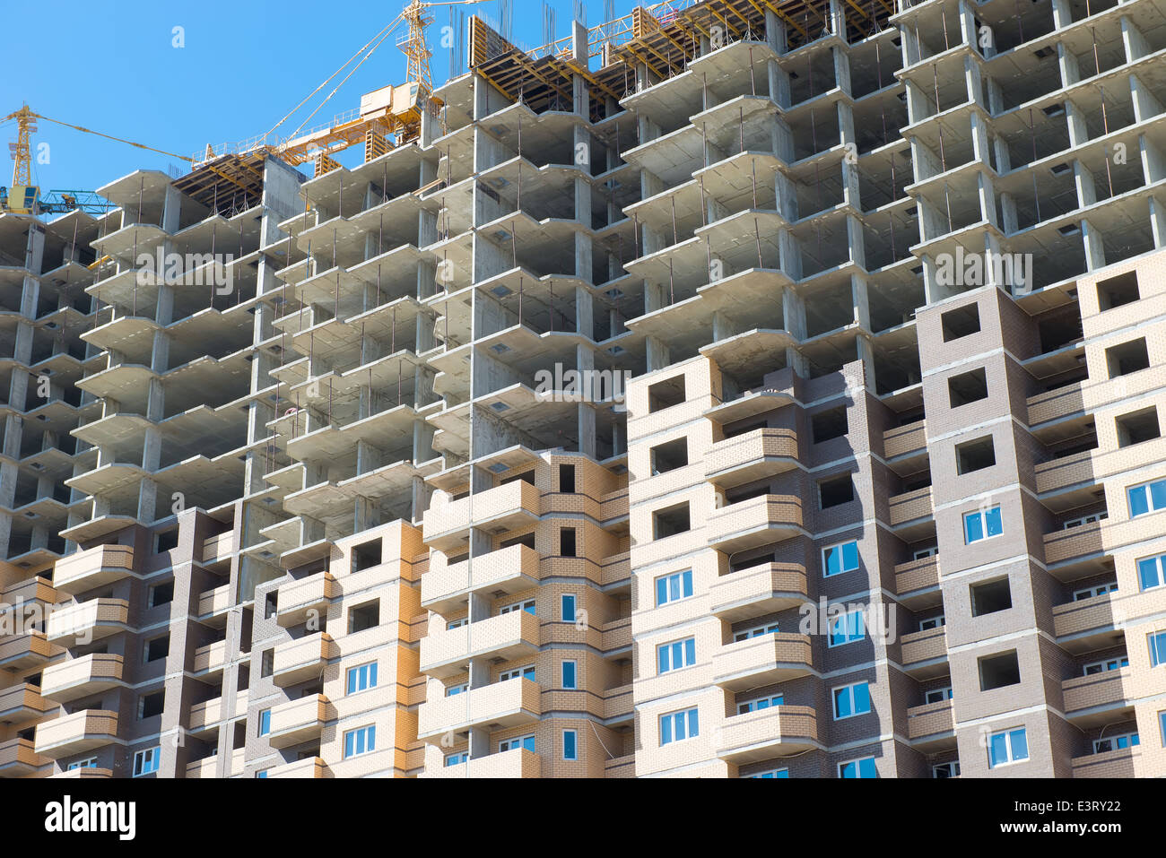 Construction of high-rise apartment house Stock Photo - Alamy