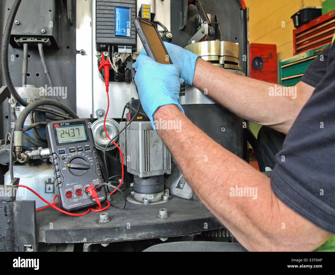 Carrying out maintenance on hi res stock photography and images Alamy