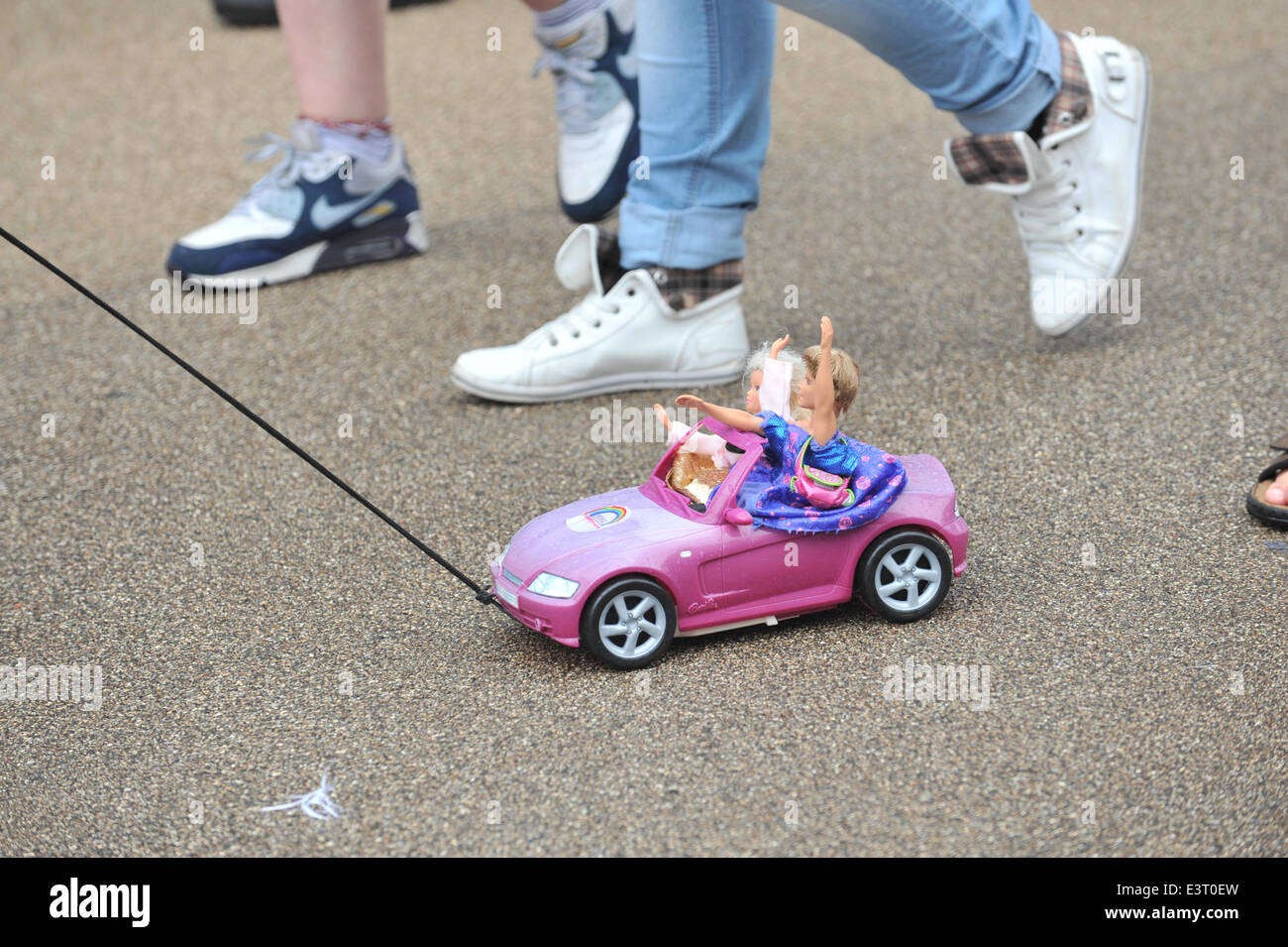 Lower Regent Street, London, UK. 28th June 2014. Barbie and Ken at the Gay Pride parade in central London. Credit:  Matthew Chattle/Alamy Live News Stock Photo