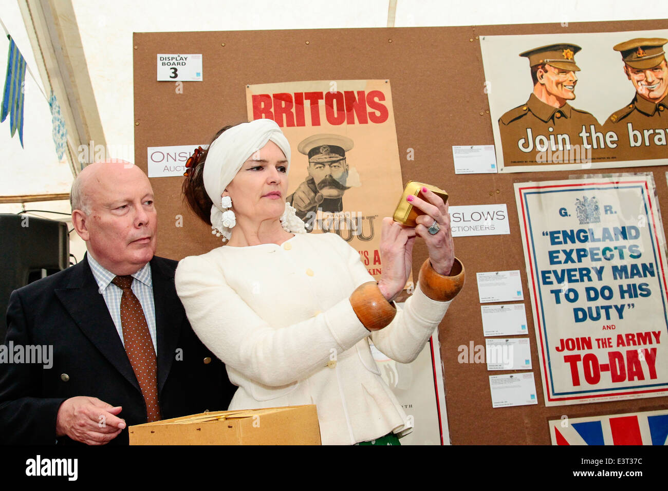 Baron Fellowes and Lady Emma Kitchener with a 1914 Bullet Pencil at Chalke Valley History Festival Stock Photo