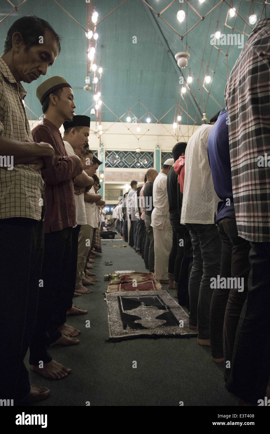 South Jakarta, Jakarta, Indonesia. 28th June, 2014. The Taraweh pray. Indonesian government announce the first ramadhan at June 29th 2014 for fasting time, it mean that the first taraweh, night pray during ramadhan held on the night 28th 2014. Credit:  Donal Husni/NurPhoto/ZUMAPRESS.com/Alamy Live News Stock Photo