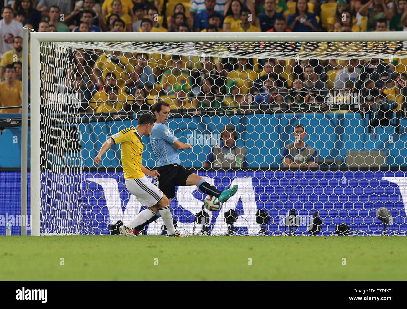 Rio De Janeiro, Brazil. 28th June, 2014. World Cup 2nd Round. Colombia versus Uruguay. James Rodriguez scores his second goal for 2-0 Credit:  Action Plus Sports/Alamy Live News Stock Photo
