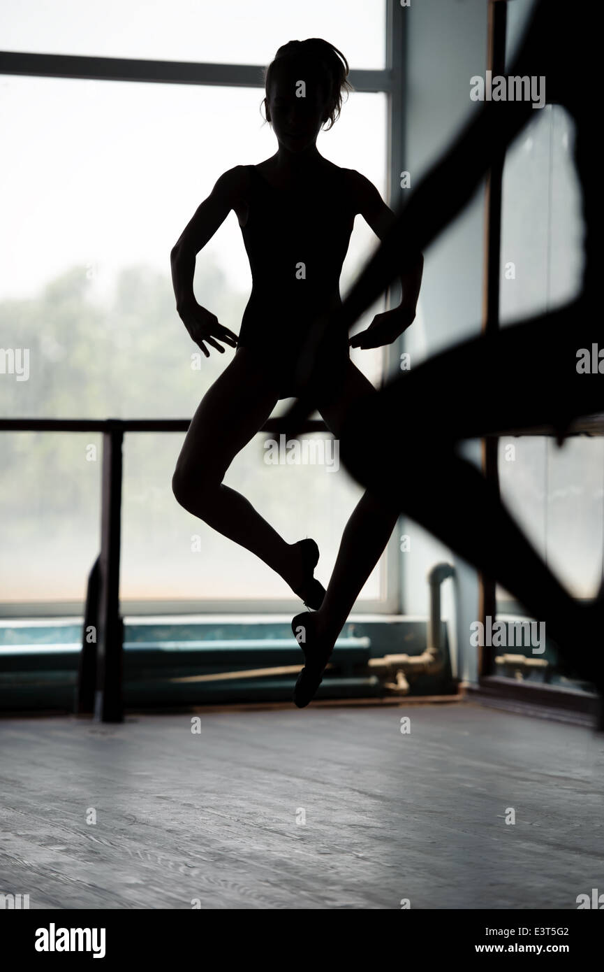 Two ballet dancers doing jumps Stock Photo Alamy