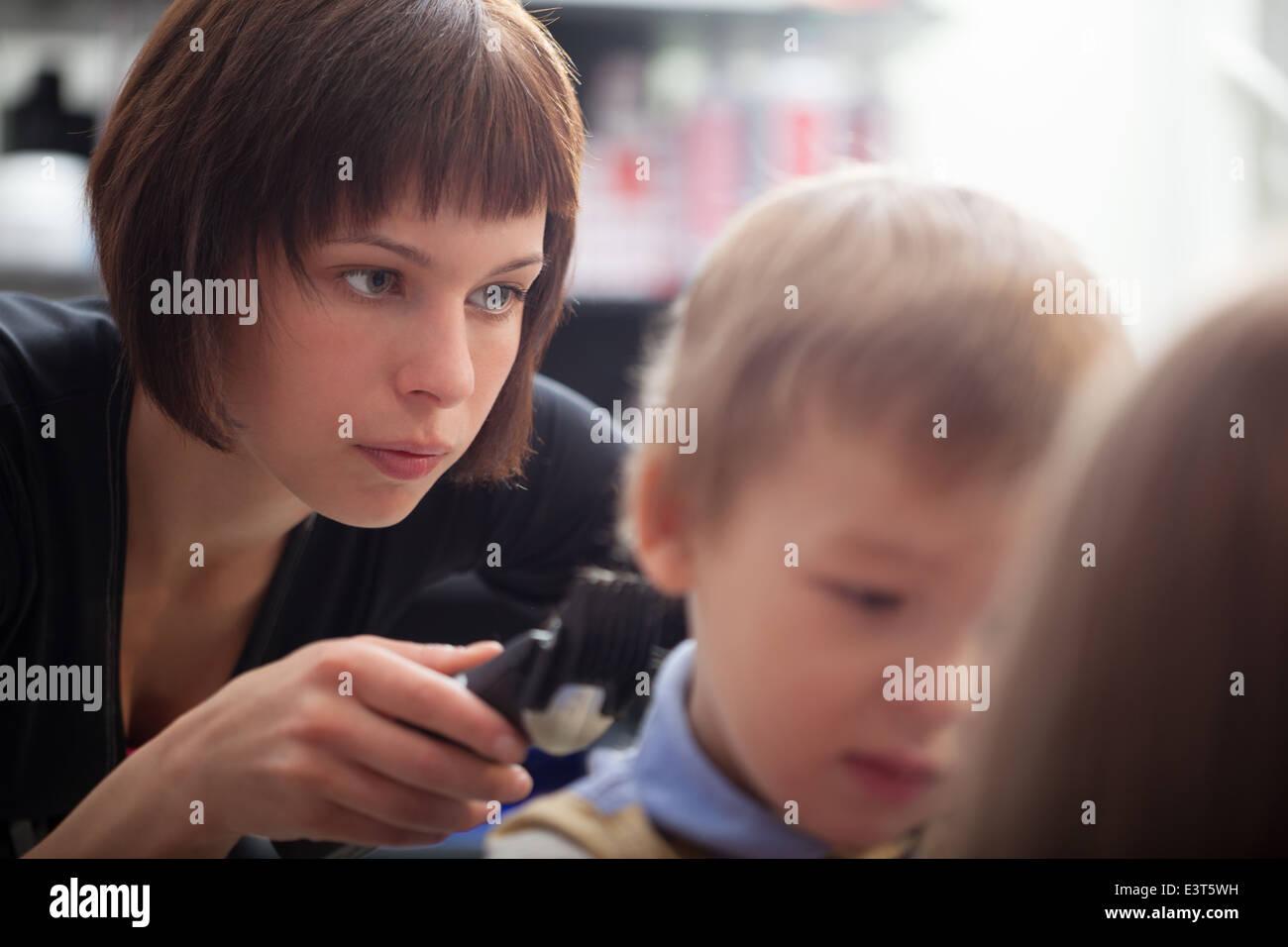 Hairstylist Cutting A Young Boys Hair Stock Photo 71216925 Alamy