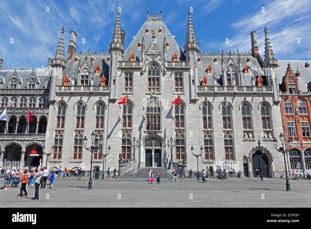BRUGGE, BELGIUM - JUNE 13, 2014: The Grote Markt and the Provinciaal Hof gothic building. Stock Photo