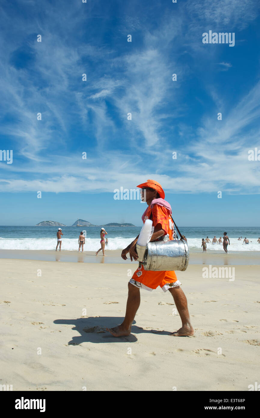 Rio De Janeiro Brazil March 10 13 Brazilian Beach Vendor Selling South American Mate Tea Walks In Uniform Along The Shore Stock Photo Alamy