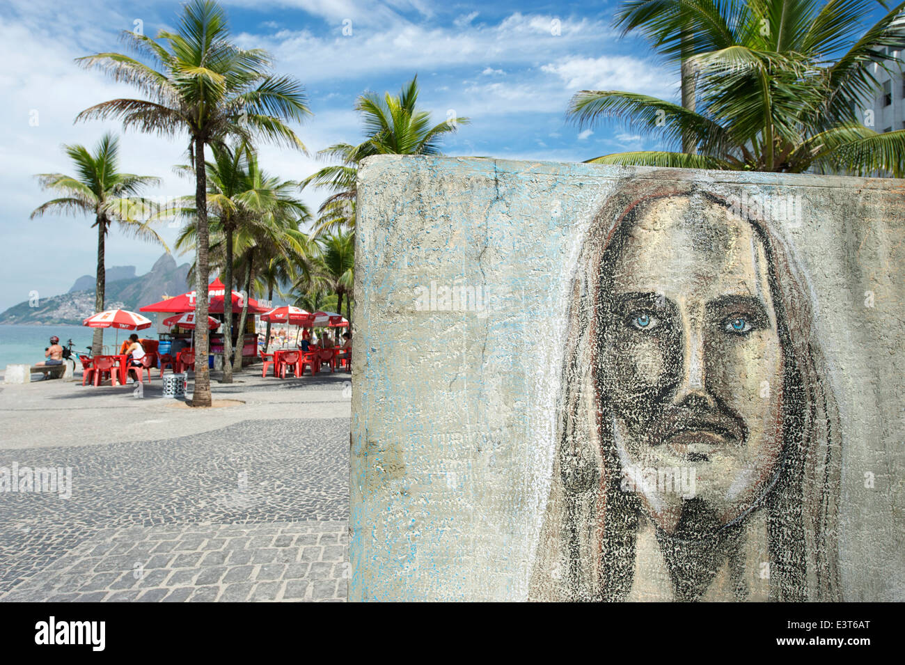 RIO DE JANEIRO, BRAZIL - FEBRUARY, 2011: Graffiti portrait in chalk of Christ the Redeemer in Arpoador, Ipanema Beach. Stock Photo