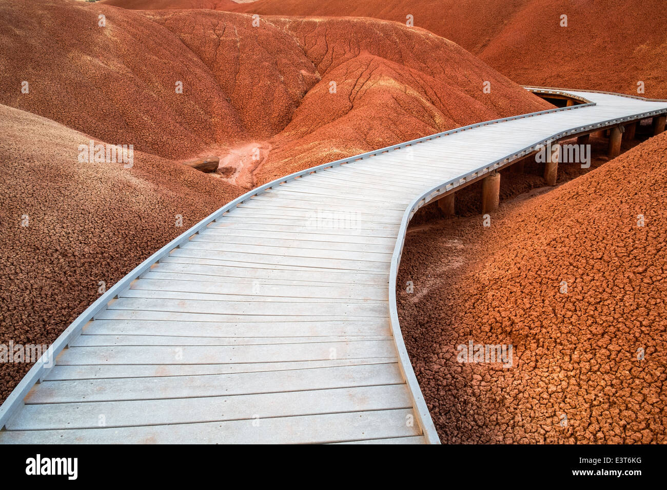 Wooden raised walkway through the Red Hills of the Painted Hills Unit of the John Day Fossil Beds National Monument, Oregon Stock Photo