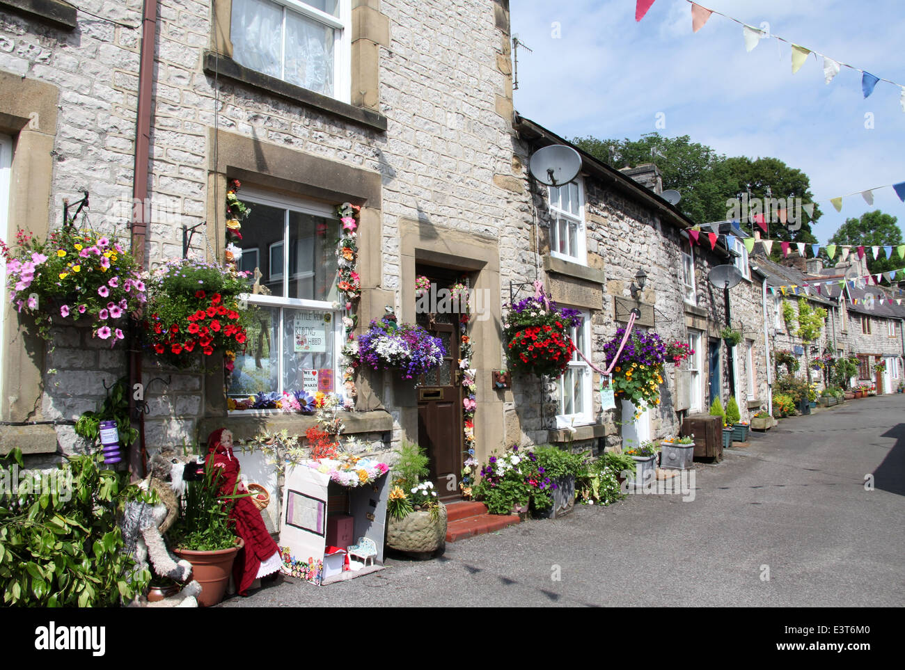 Derbyshire village of Tideswell in the Peak District National Park decorated for Wakes Week Stock Photo