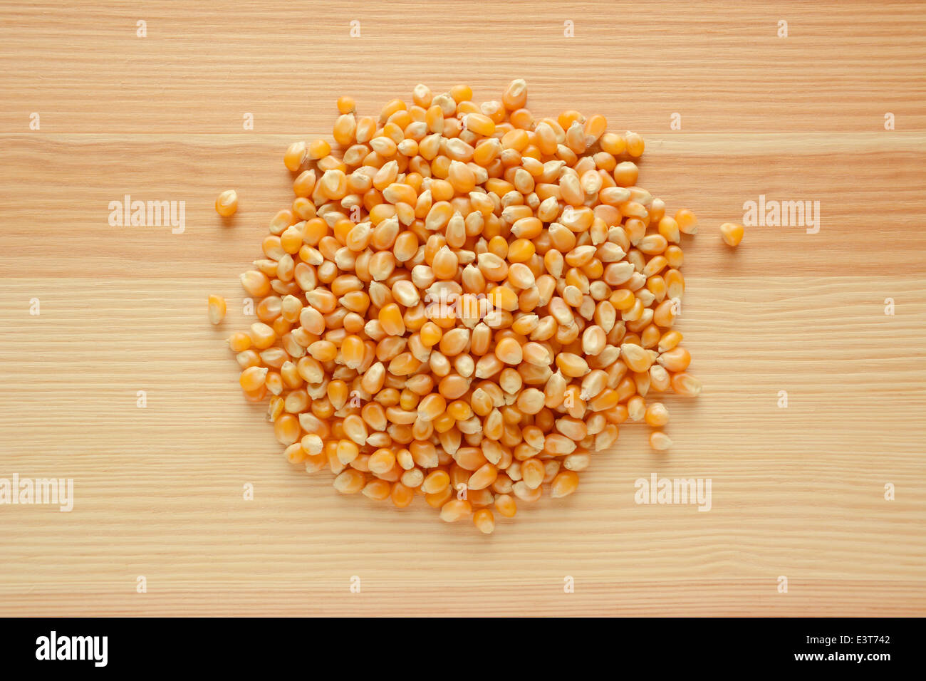 Popcorn maize on a wooden background Stock Photo