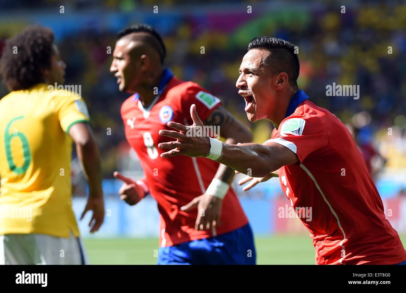 Belo Horizonte, Brazil. 28th June, 2014. Chile's Alexis Sanchez (R) celebrates the goal during a Round of 16 match between Brazil and Chile of 2014 FIFA World Cup at the Estadio Mineirao Stadium in Belo Horizonte, Brazil, on June 28, 2014. Credit:  Liu Dawei/Xinhua/Alamy Live News Stock Photo