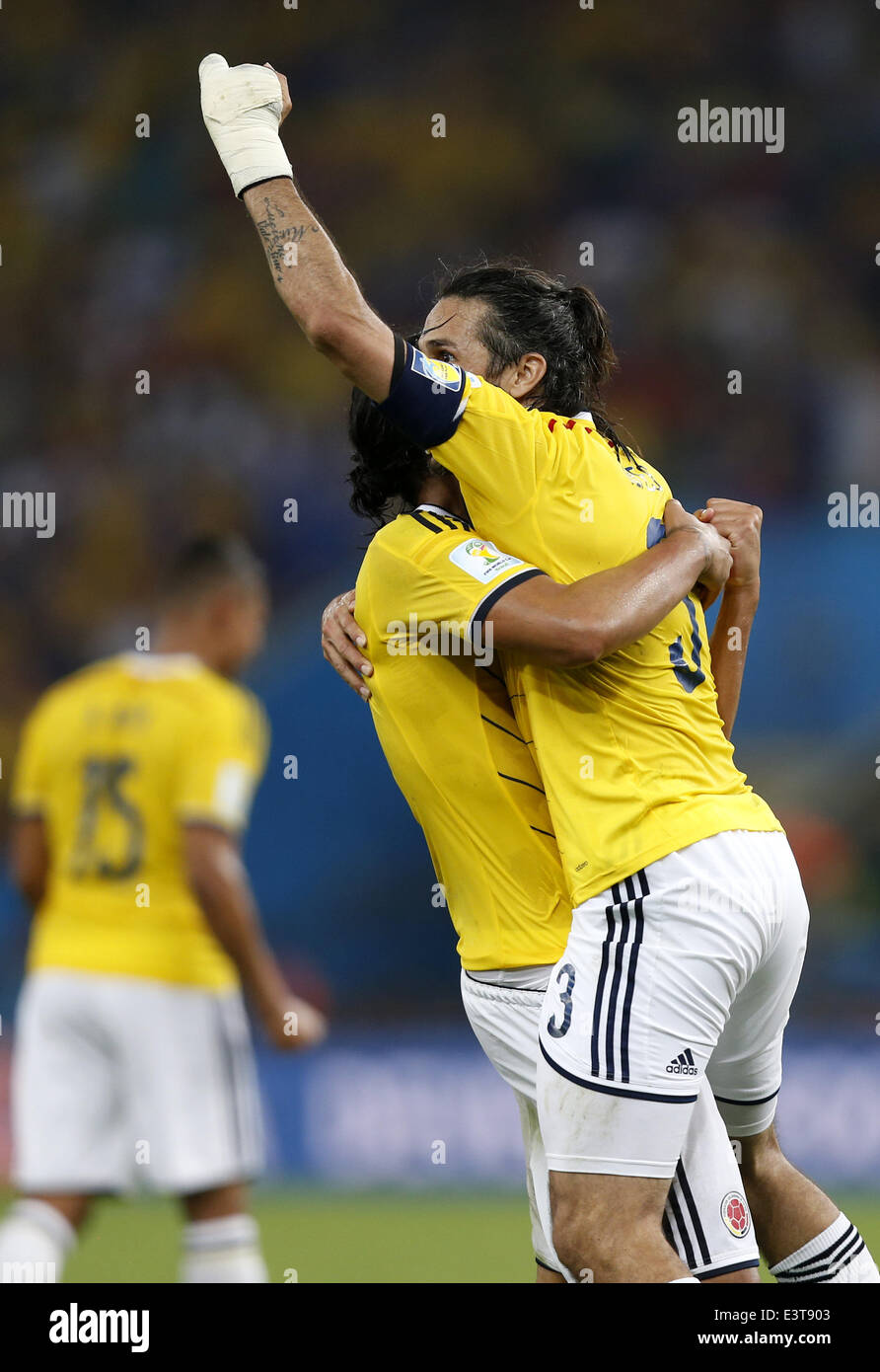 Rio De Janeiro, Brazil. 28th June, 2014. Colombia's Mario Yepes (R) celebrates the victory after a Round of 16 match between Colombia and Uruguay of 2014 FIFA World Cup at the Estadio do Maracana Stadium in Rio de Janeiro, Brazil, on June 28, 2014. Colombia won 2-0 over Uruguay and qualified for Quarter-finals on Saturday. Credit:  Wang Lili/Xinhua/Alamy Live News Stock Photo