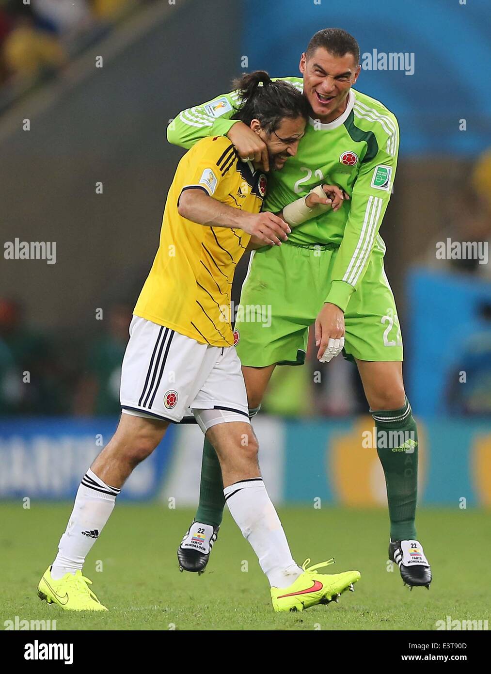 Rio De Janeiro, Brazil. 28th June, 2014. Colombia's goalkeeper Faryd Mondragon (R) and Mario Yepes celebrate the victory after a Round of 16 match between Colombia and Uruguay of 2014 FIFA World Cup at the Estadio do Maracana Stadium in Rio de Janeiro, Brazil, on June 28, 2014. Colombia won 2-0 over Uruguay on Saturday. Credit:  Xu Zijian/Xinhua/Alamy Live News Stock Photo