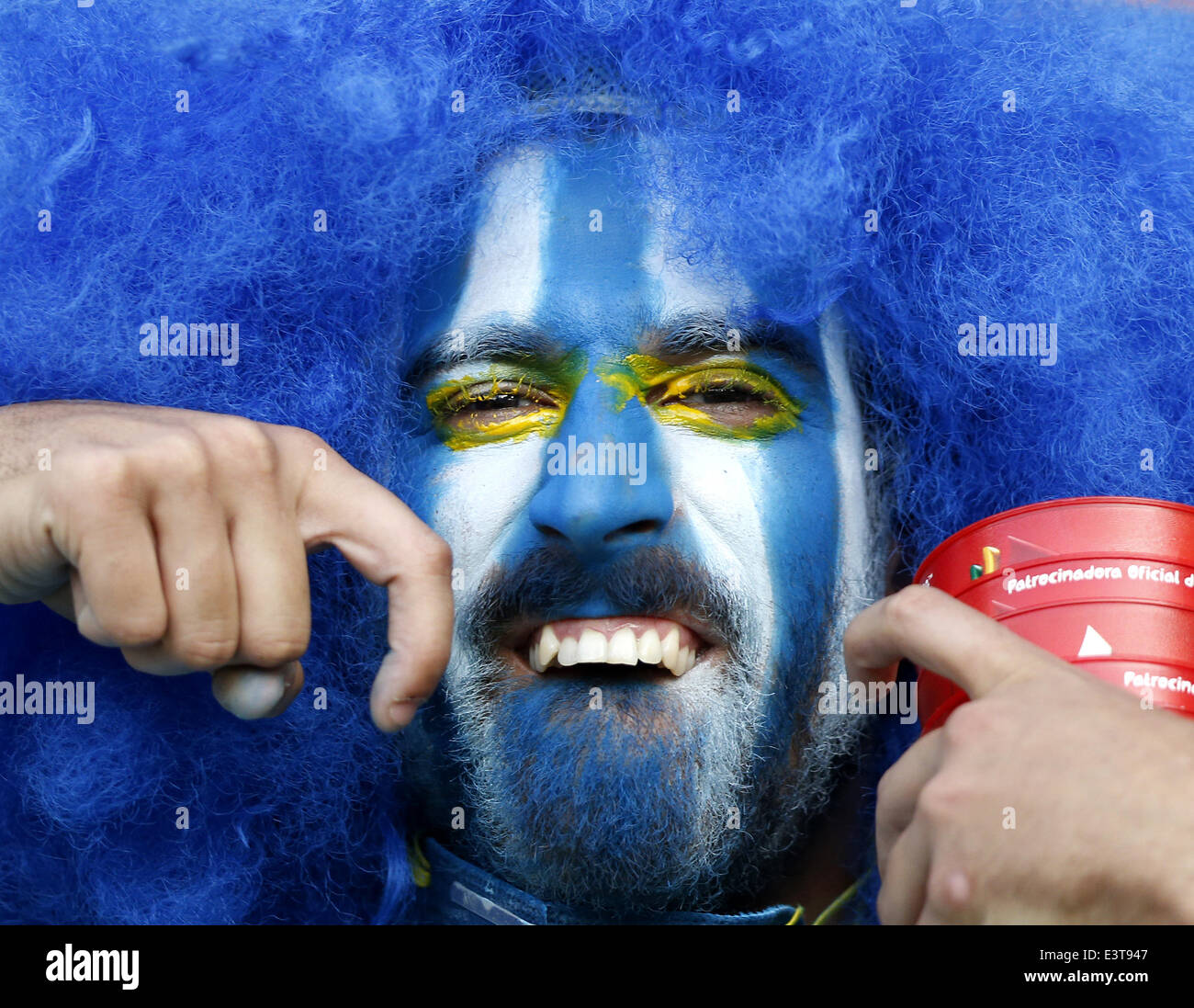 Rio De Janeiro, Brazil. 28th June, 2014. A supporter of Uruguay poses before a Round of 16 match between Colombia and Uruguay of 2014 FIFA World Cup at the Estadio do Maracana Stadium in Rio de Janeiro, Brazil, on June 28, 2014. Colombia won 2-0 over Uruguay and qualified for Quarter-finals on Saturday. Credit:  Wang Lili/Xinhua/Alamy Live News Stock Photo