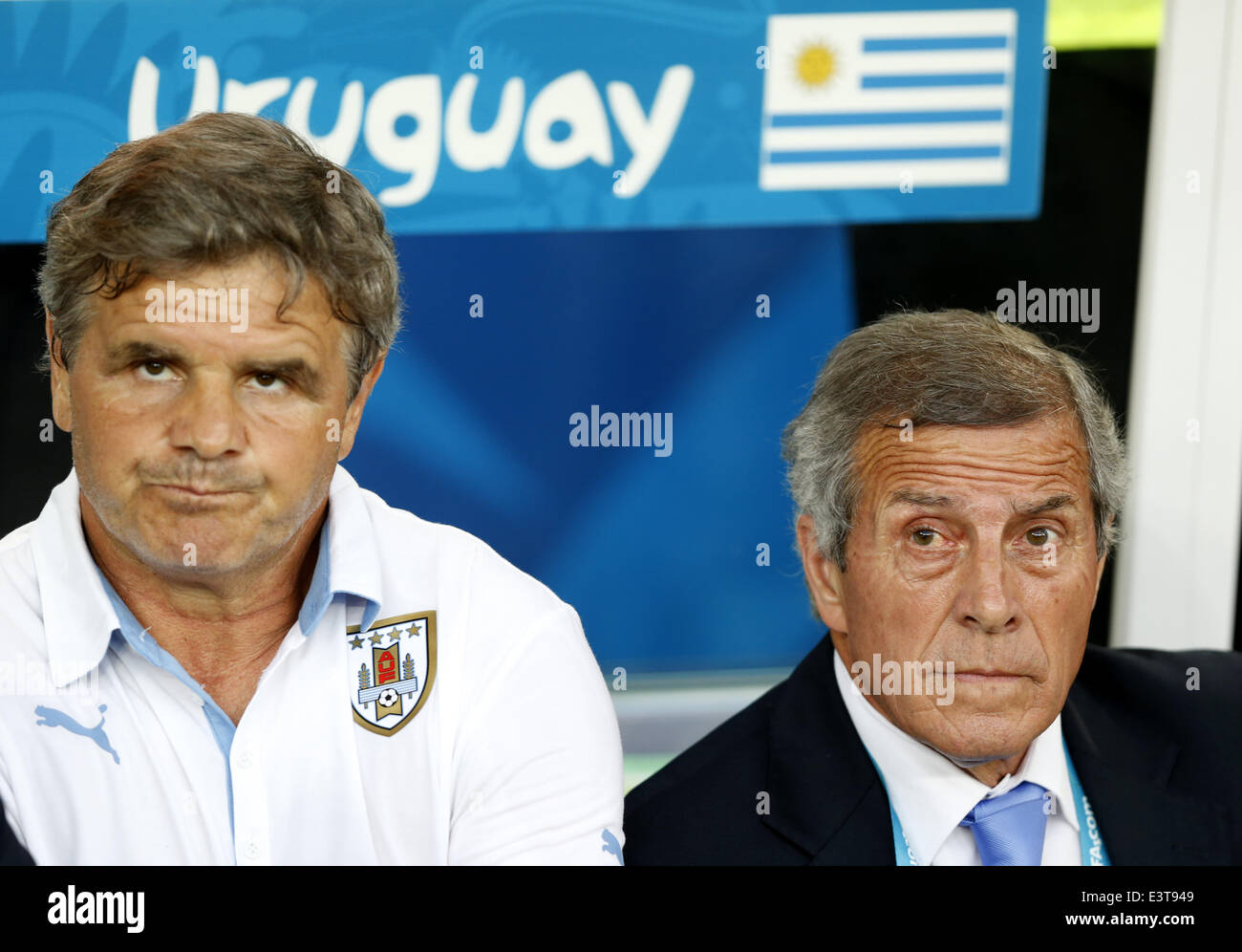 Rio De Janeiro, Brazil. 28th June, 2014. Uruguay's coach Oscar Washington Tabarez (R) looks on during a Round of 16 match between Colombia and Uruguay of 2014 FIFA World Cup at the Estadio do Maracana Stadium in Rio de Janeiro, Brazil, on June 28, 2014. Colombia won 2-0 over Uruguay and qualified for Quarter-finals on Saturday. Credit:  Wang Lili/Xinhua/Alamy Live News Stock Photo