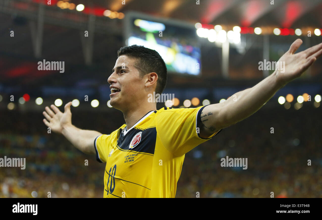 Rio De Janeiro, Brazil. 28th June, 2014. Colombia's James Rodriguez celebrates his first goal during a Round of 16 match between Colombia and Uruguay of 2014 FIFA World Cup at the Estadio do Maracana Stadium in Rio de Janeiro, Brazil, on June 28, 2014. Colombia won 2-0 over Uruguay and qualified for Quarter-finals on Saturday. Credit:  Wang Lili/Xinhua/Alamy Live News Stock Photo