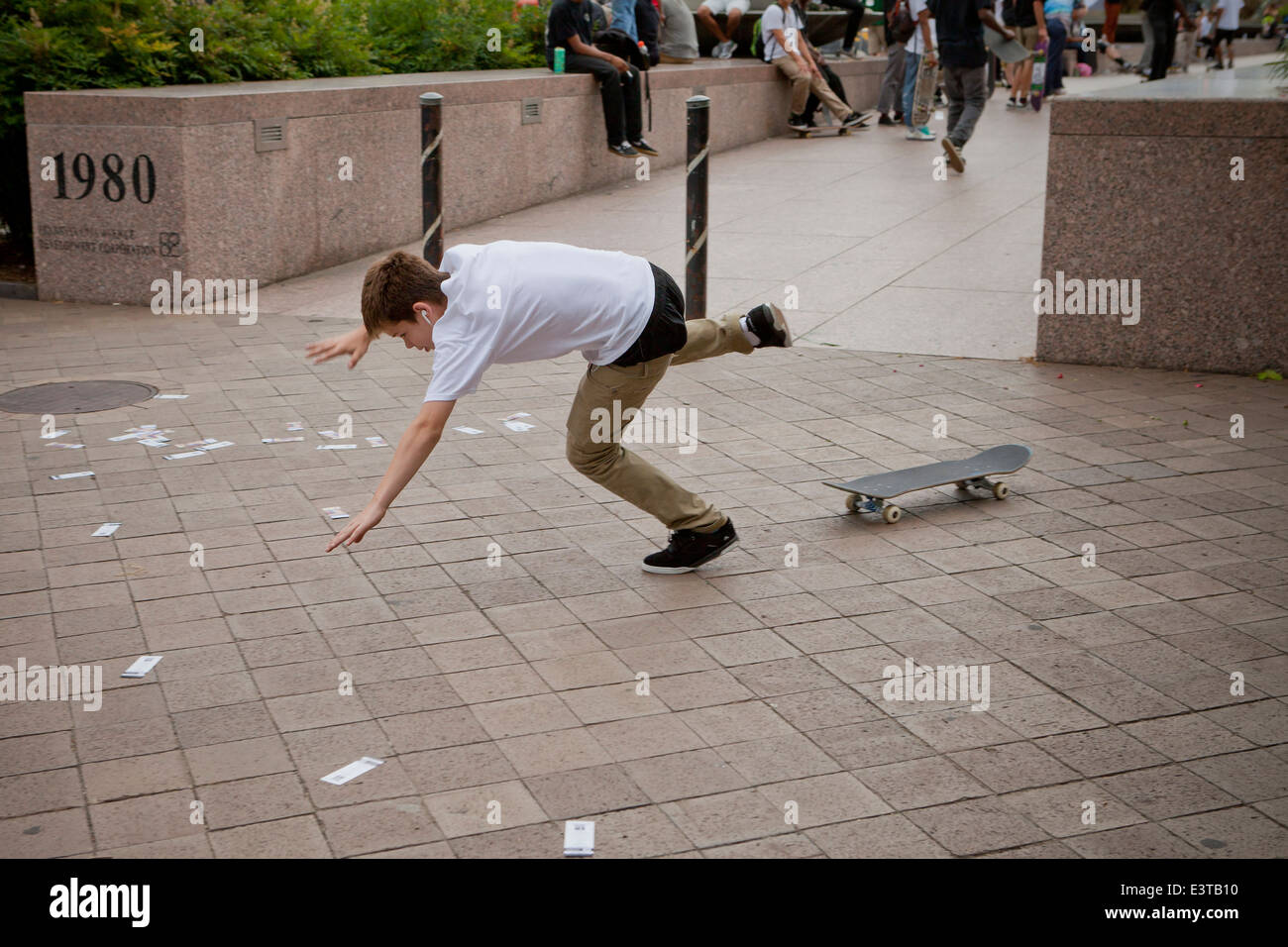 Street skateboarder falling from jump - USA Stock Photo