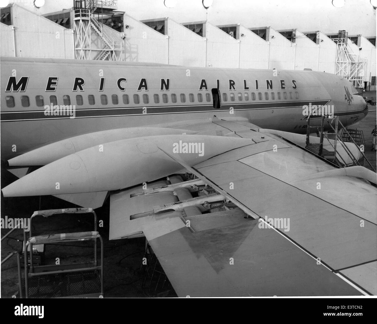 The Convair 990 was a commercial airliner produced by Convair in the 1960s. This factory photo shows the production line and assembly process for the aircraft, which was designed for high-speed commercial travel. Stock Photo