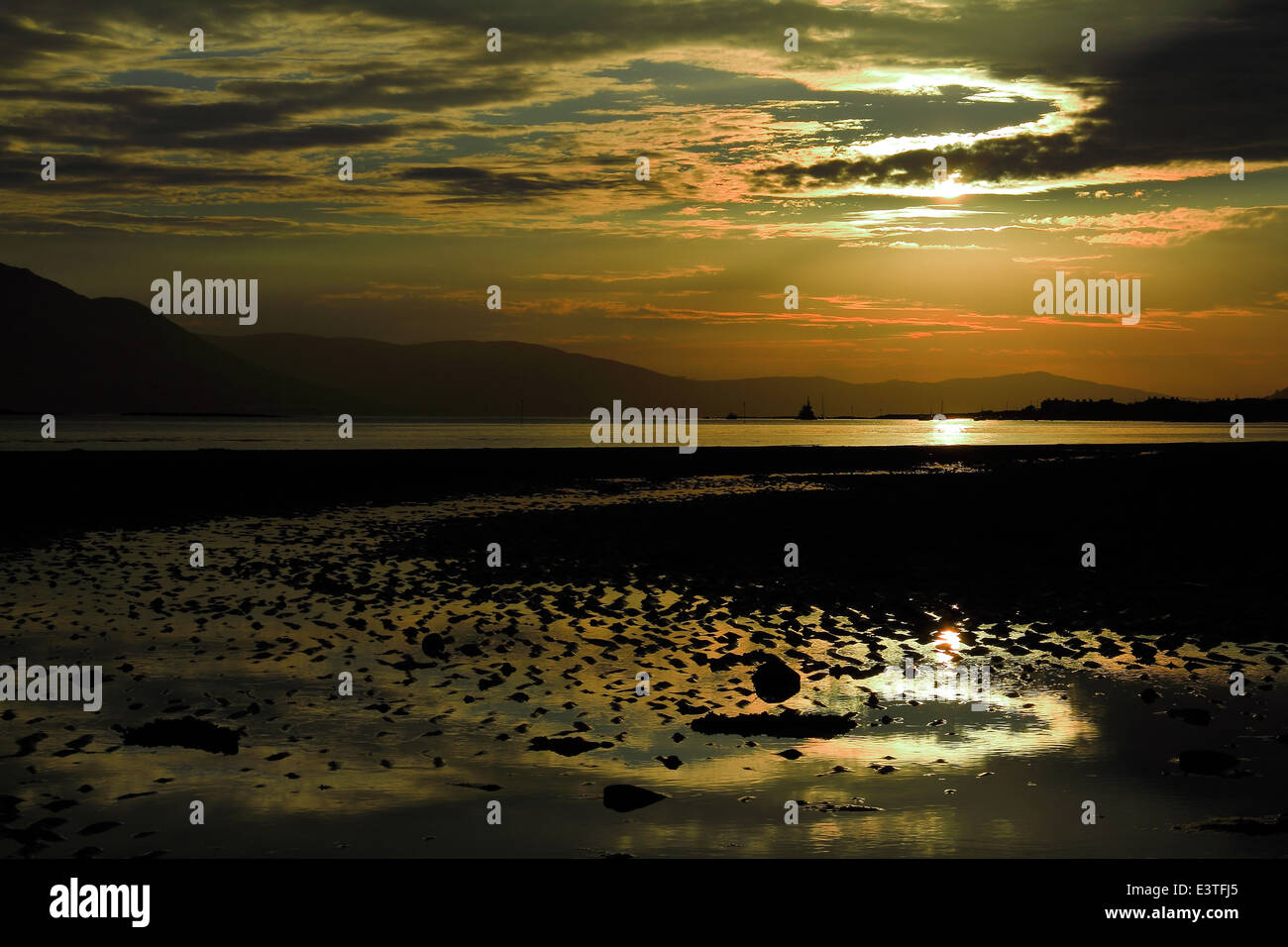 Sunset on Carlingford Lough looking from Cranfield Beach towards Carlingford, County Down, Northern Ireland Stock Photo