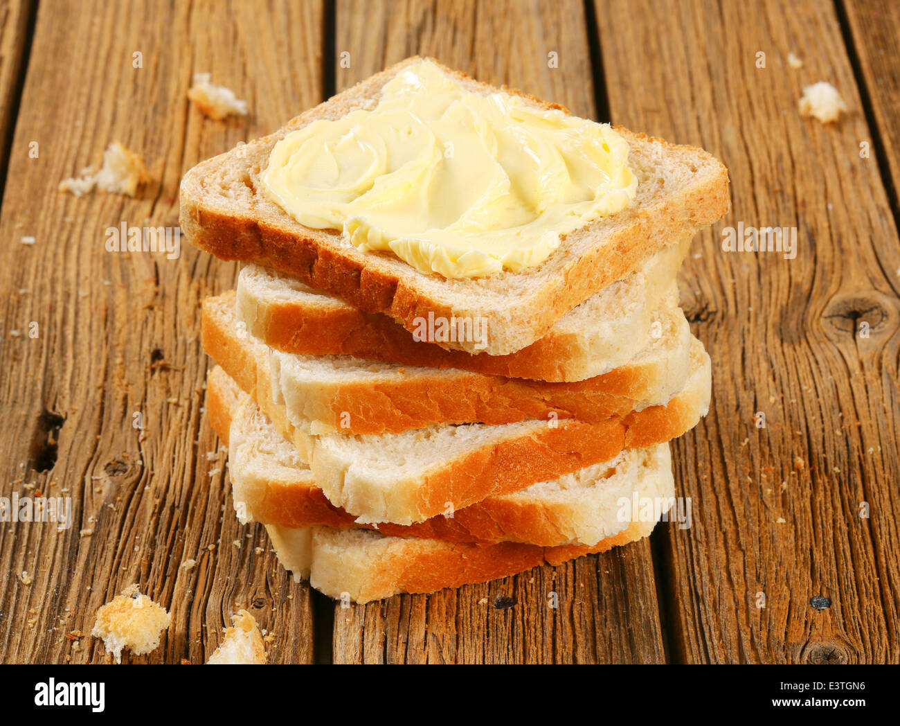 Slices of sandwich bread and butter Stock Photo Alamy