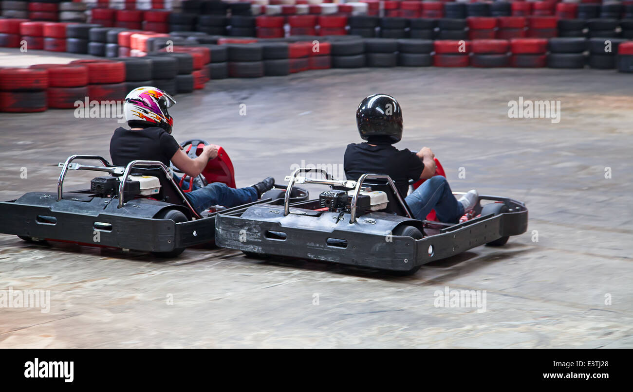Indoor Karting Race 2 Kart And Safety Barriers Stock Photo