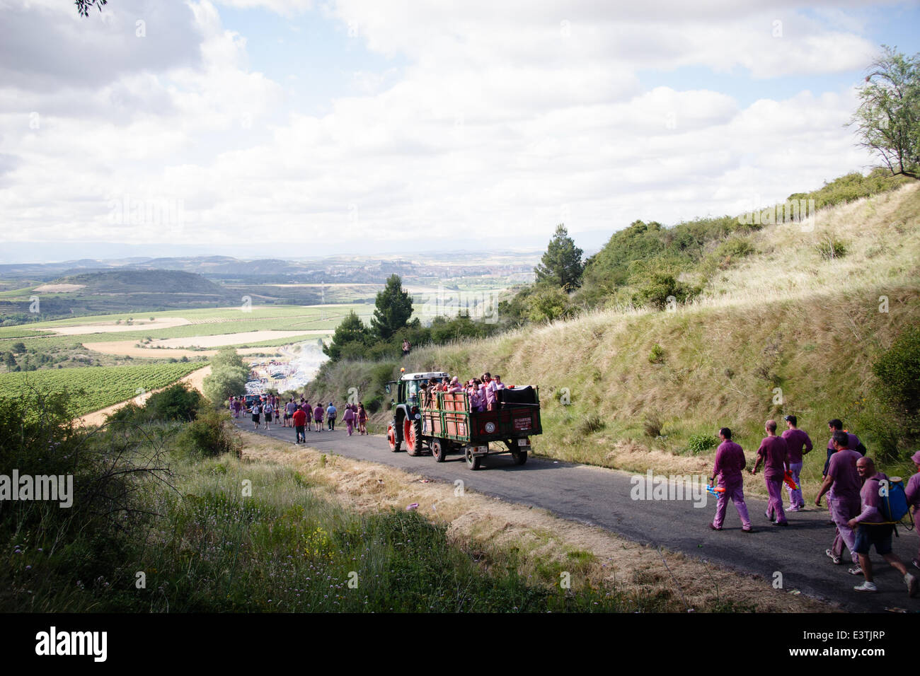Riscos de Bilibio, Haro, La Rioja, Spain. 29 June 2014. Revellers at Haro Wine Battle held annually on St Peter's Day. The battle sees thousands of people climb a mountain near the town of Haro and poor wine over each other. Haro is at the heart of the Rioja wine region. In 2013 35% of Rioja exports were destined for the UK. Credit:  James Sturcke/Alamy Live News Stock Photo