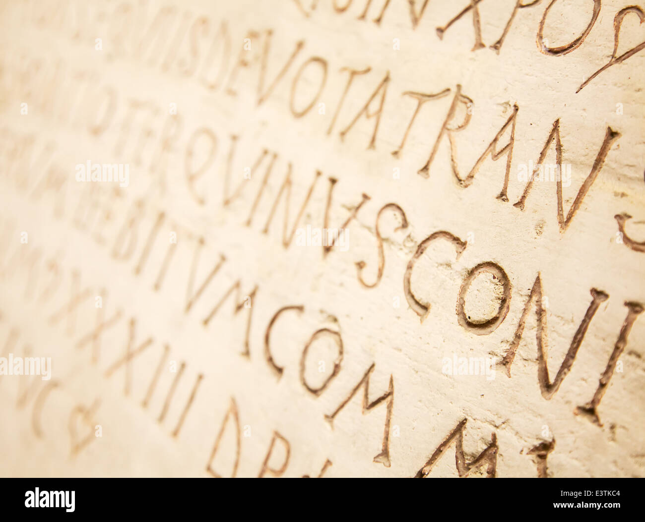 Pre-christian latin writing carved on the tombstone Stock Photo