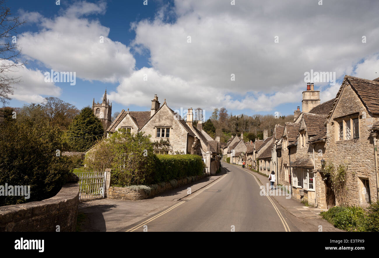 Castle Combe, Wiltshire, general street view of Cotswold stone cottages, bright sun Stock Photo