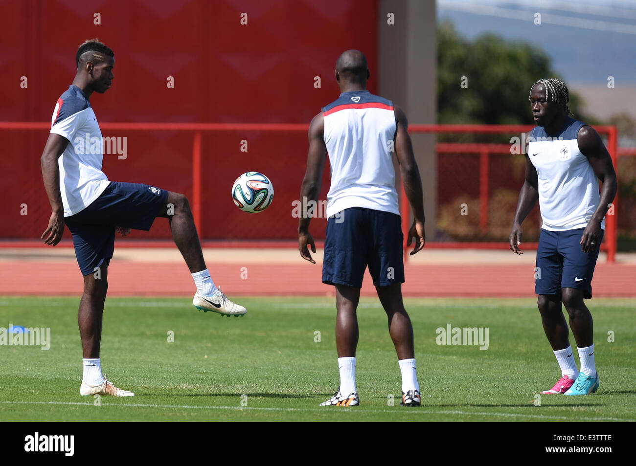 Brasilia, Brazil. 29th June, 2014. France's national soccer players Paul Pogba (L) and Bacary Sagna (R) during a training session at the Centro de Capacitacao Fisica dos Bombeiros in Brasilia, Brazil, 29 June 2014. France will face Nigeria in the FIFA World Cup 2014 round of 16 match in Brasilia on 30 June 2014. Photo: Marius Becker/dpa/Alamy Live News Stock Photo