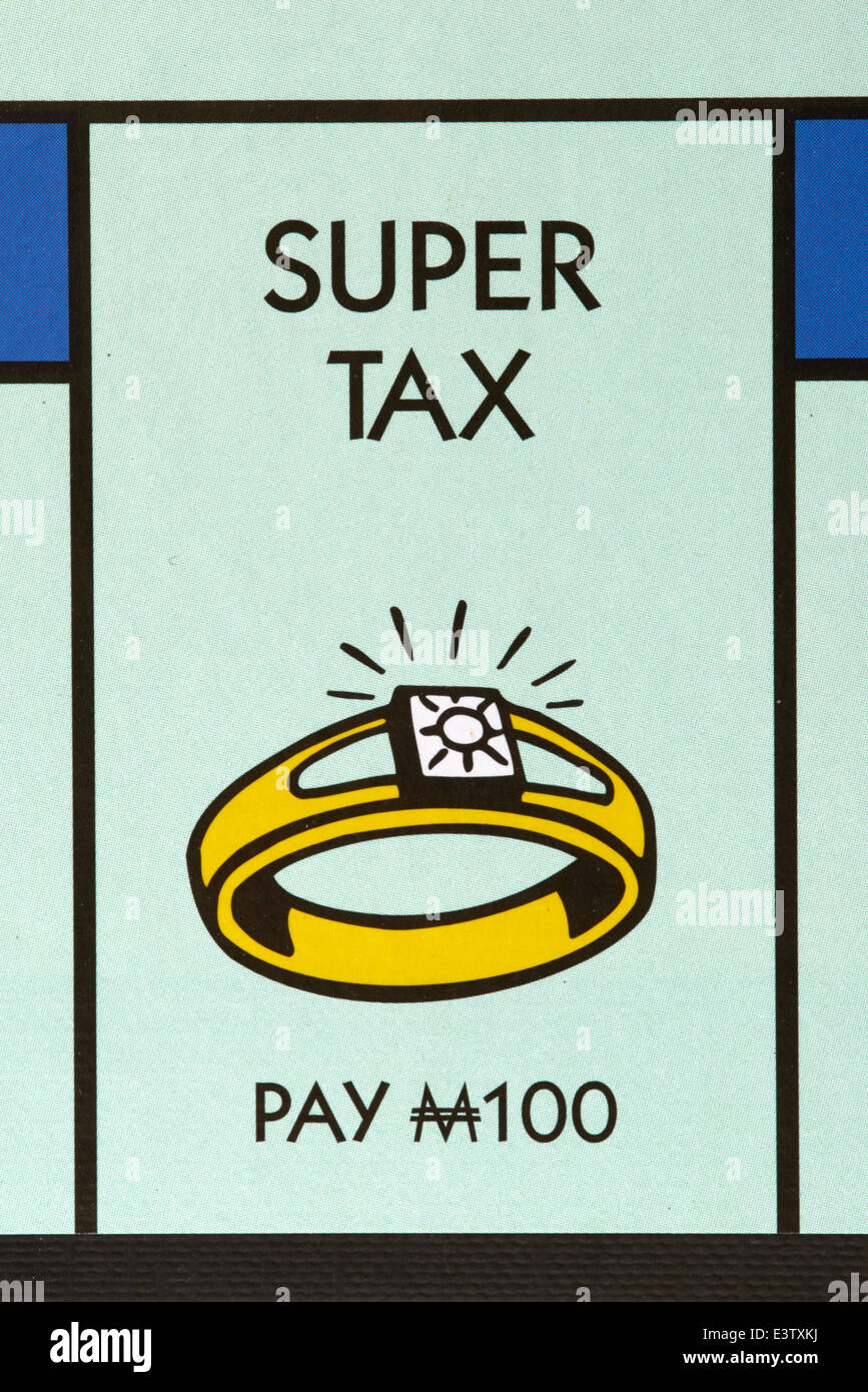 Super Tax on a Monopoly Game Board Stock Photo