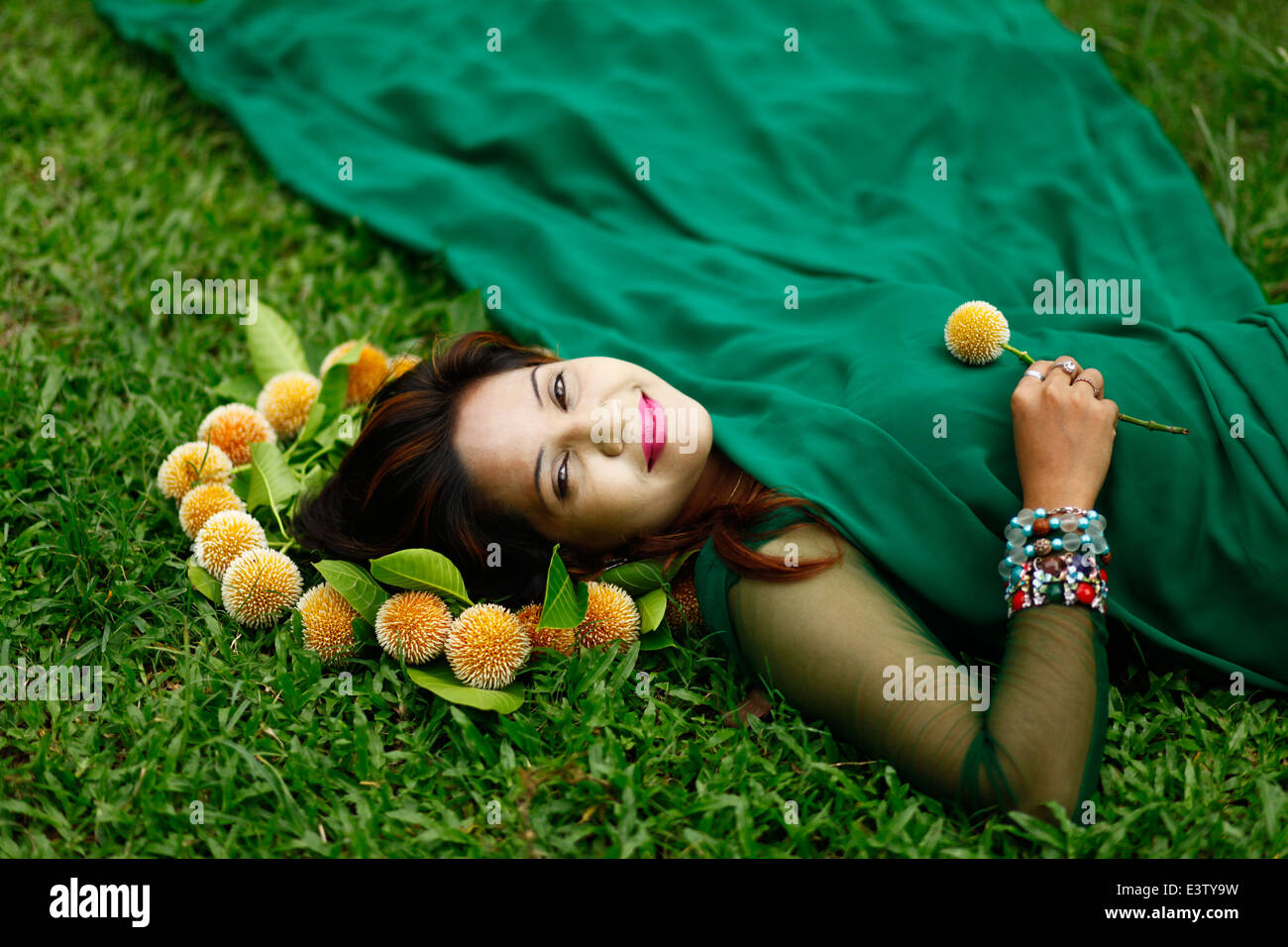 a couple present their love with kadam flowers. The Kadam flower