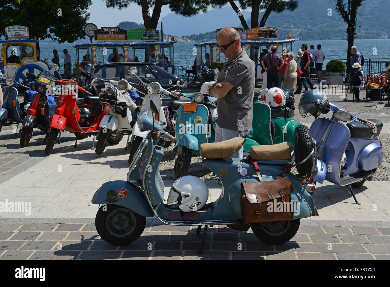 Vintage Italian Vespa scooter at scooters rally in Italy. 1964 Vespa 150 in foreground Stock Photo