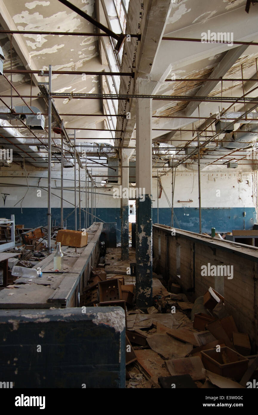 Ruins of an abandoned factory. Industrial interior abstract architecture. Stock Photo