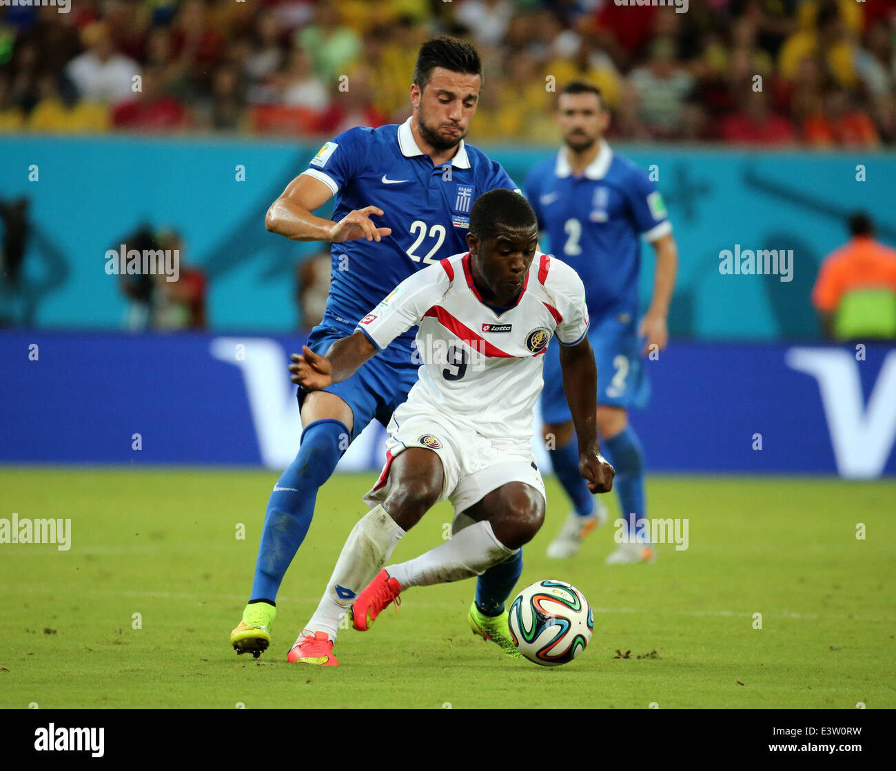 Recife, Brazil. 29th June, 2014. World Cup 2nd Round. Costa Rica versus Greece. Campbell challenged by Samaris Credit:  Action Plus Sports/Alamy Live News Stock Photo