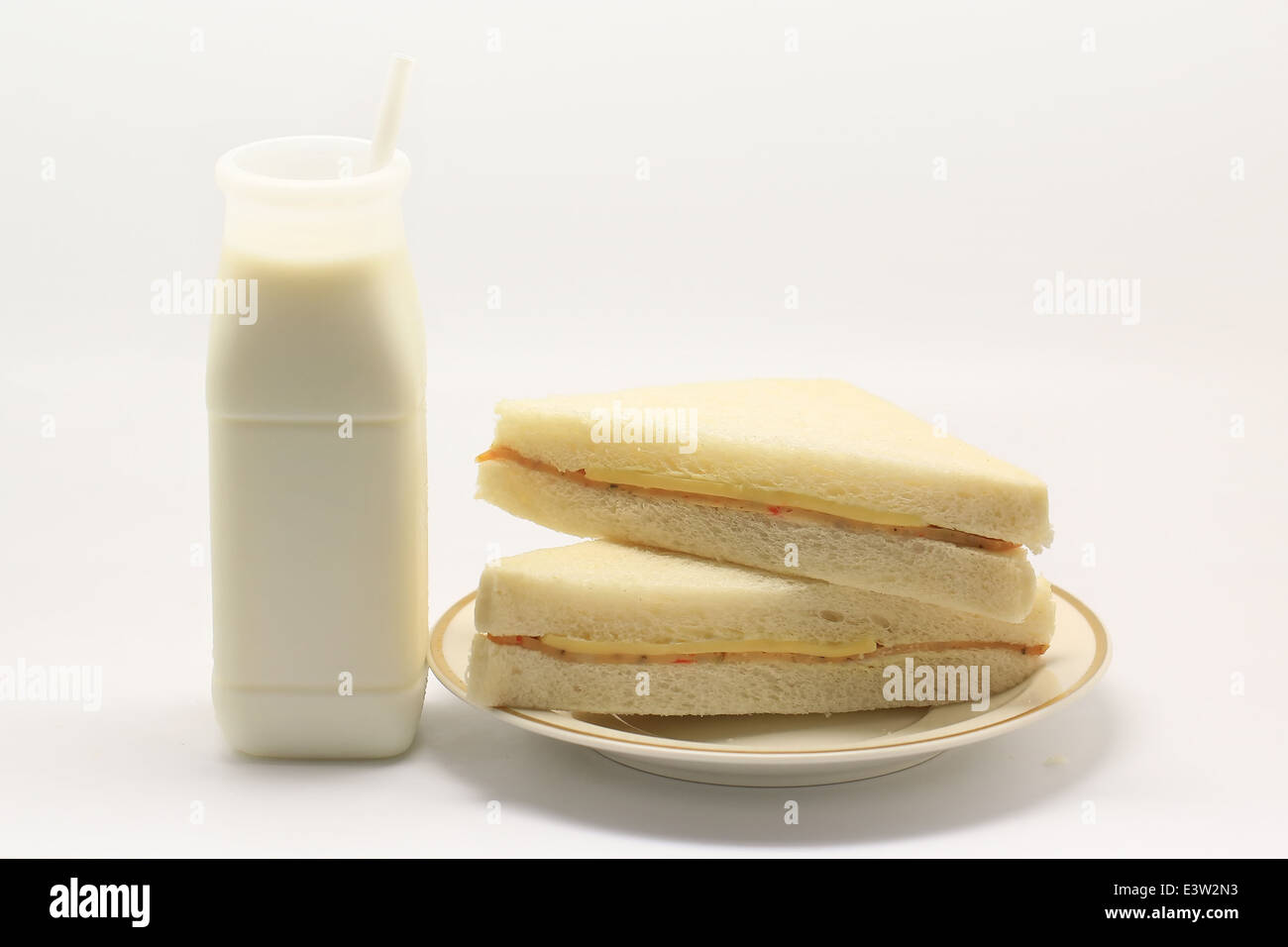 sandwich and milk isolated on white background Stock Photo Alamy