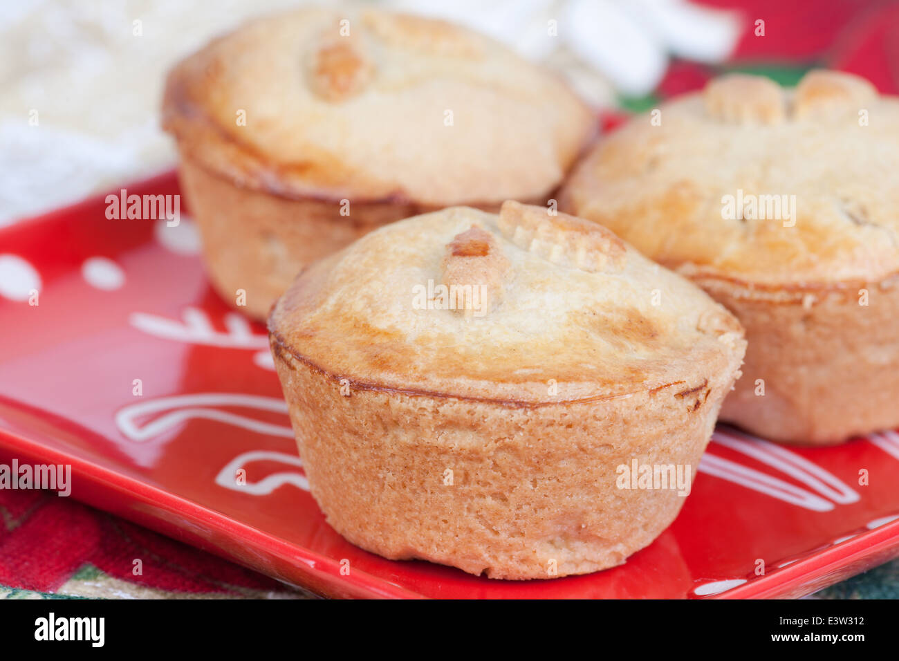 mince pies on the red plate Stock Photo