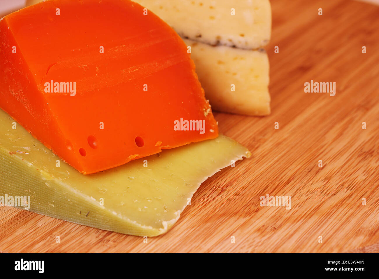 Various types of french cheese on wooden board close-up Stock Photo